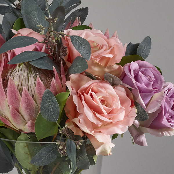 pinkproteapinkandlavenderroseseucalyptuscloseup